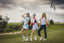 Girls wearing women's golf accessories on the golf green