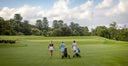 Women's Golf clothing, girls walking down the fairway 