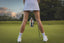 Women's Golf bottoms, girls golf pants, women on golf green wearing activewear for golf