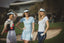 Women on golf green, wearing Golf Polo Shirt, golf skirt, golf pants and golf dress. 